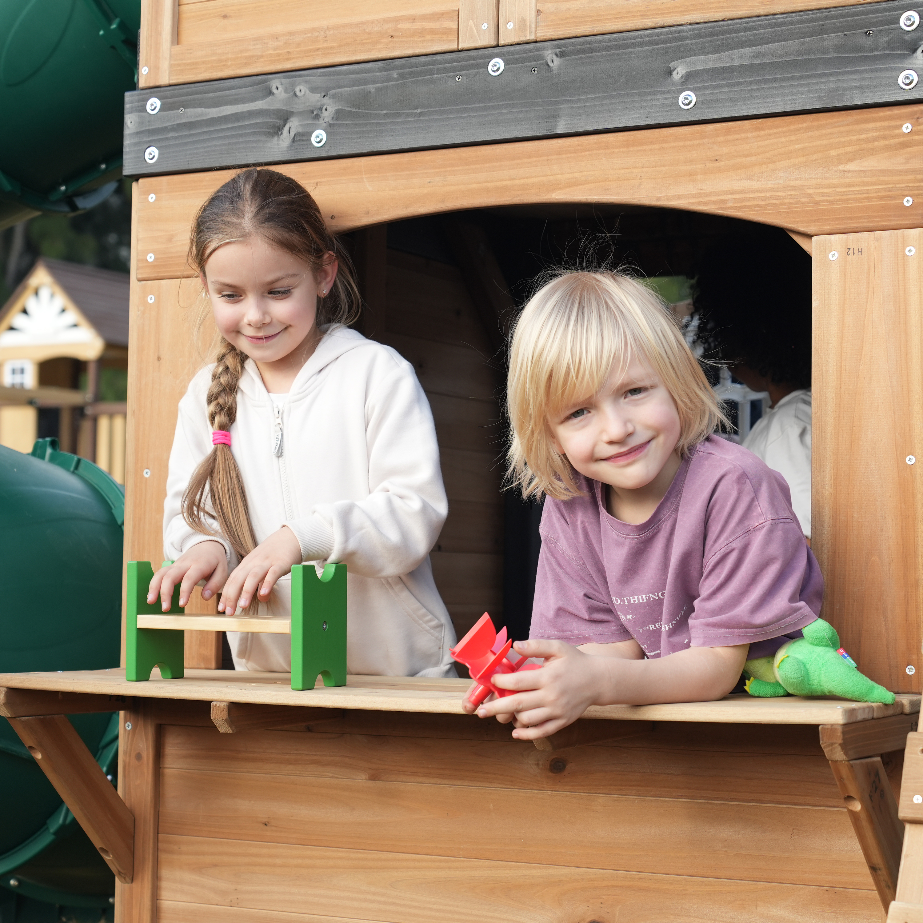 AXI Noud Climbing Frame with Playhouse, Swings, Trapeze and Climbing Wall – Blue Slide and Tube Slide