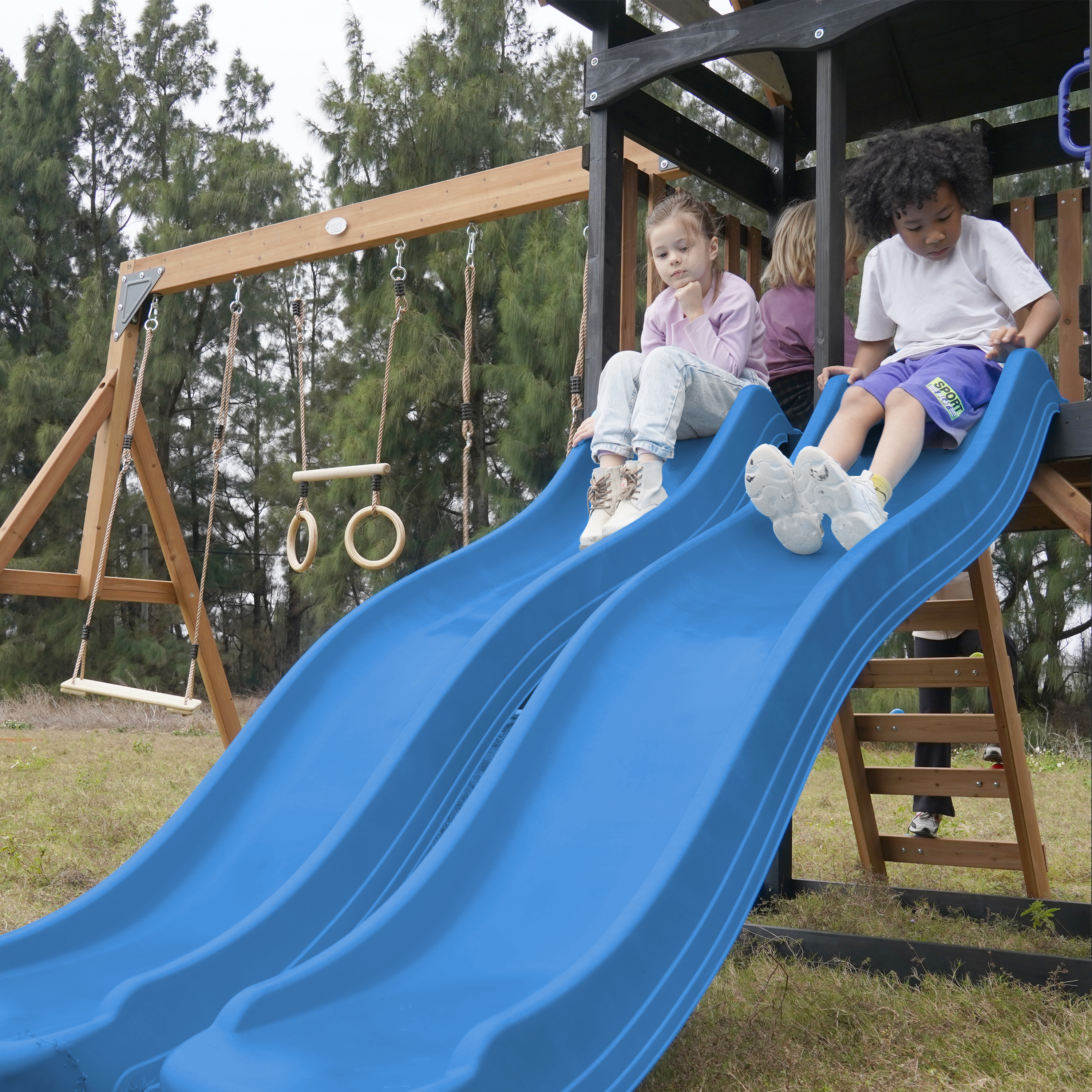AXI Cody Climbing Frame with Swings. Trapeze and Climbing Wall – Blue Double Slide and Tube Slide